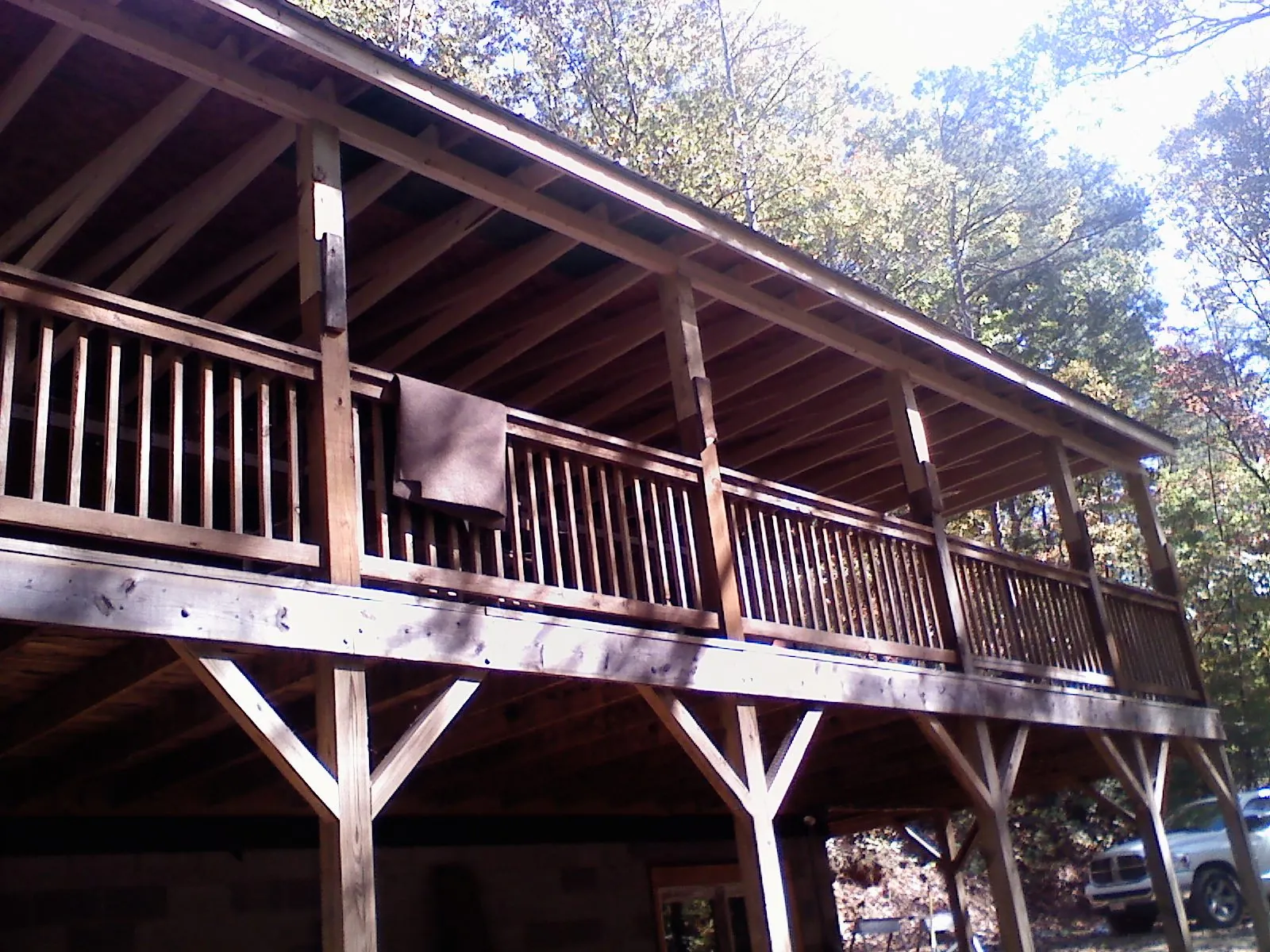 Timber framing under a new elevated porch and deck — Roof Leak Repair in Selden by Roofing Brothers